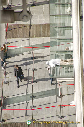 Looking down to ground level of the Centre Pompidou. Spot the artwork!